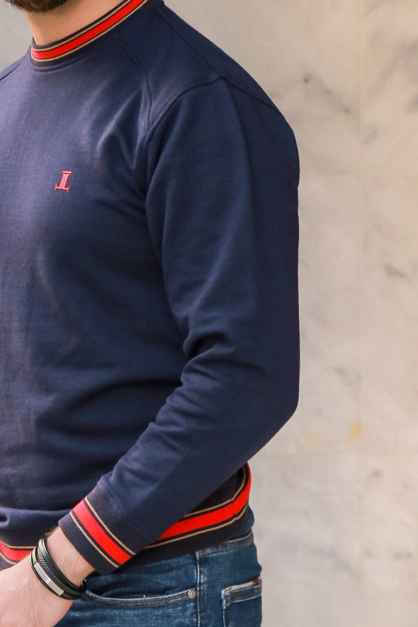 Mens winter sweatshirt in dark blue colour with red sriped collar and cuffs by JULKE. 