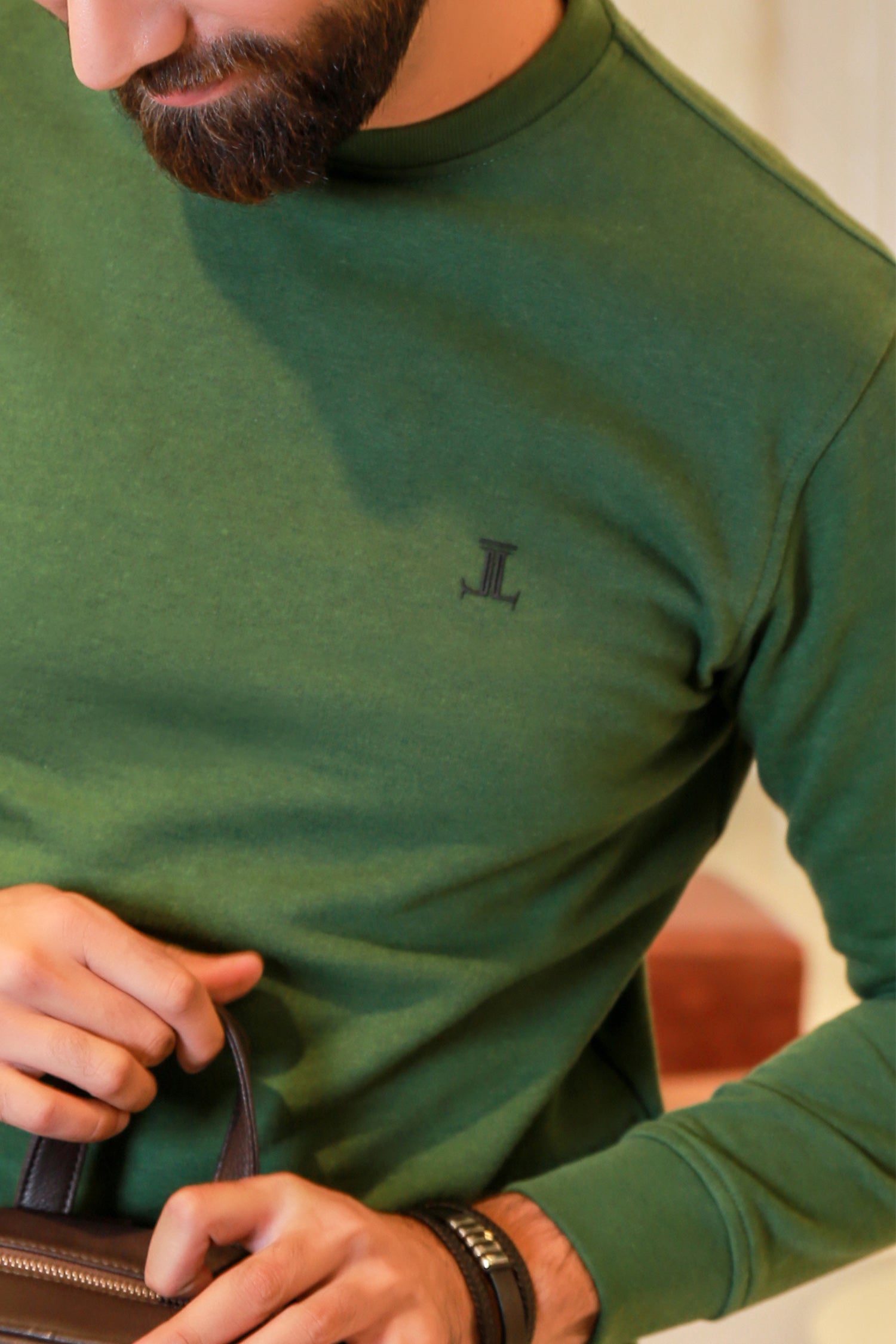 Mens winter sweatshirt in green colour with fleece lining by JULKE. 