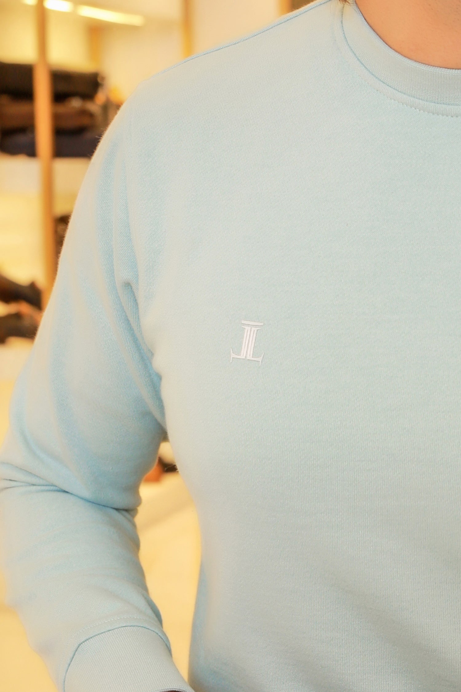 Mens winter sweatshirt in light blue colour with fleece lining by JULKE. 