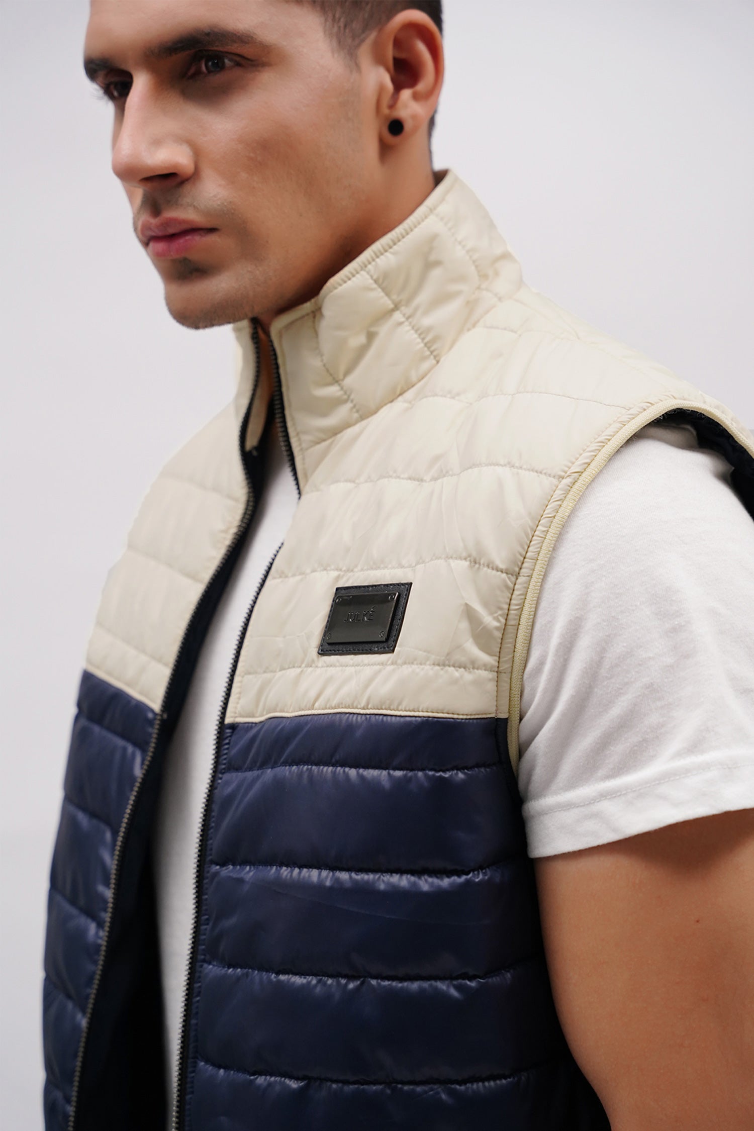 Mens winter puffer vest sleeveless in off white & navy blue colour with quilting by JULKE