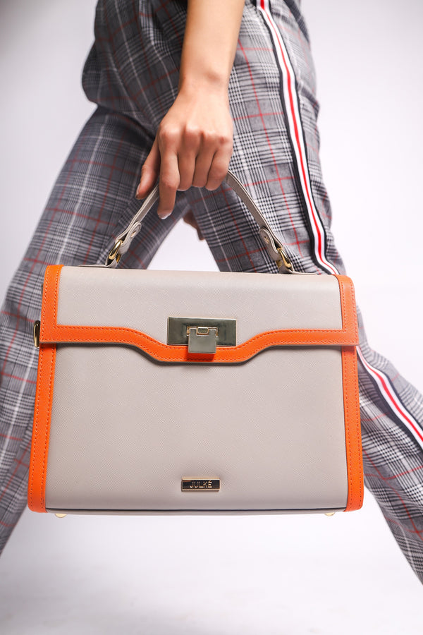 Womens leather bag with top handle and shoulder strap in grey & orange colour by JULKE